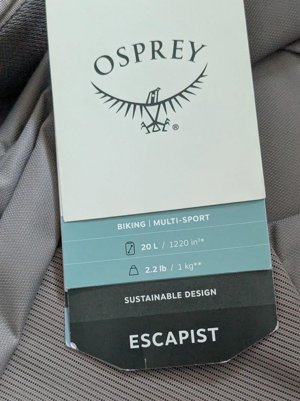 OSPREY Escapist 20 Backpack — Light Gray with Black Base